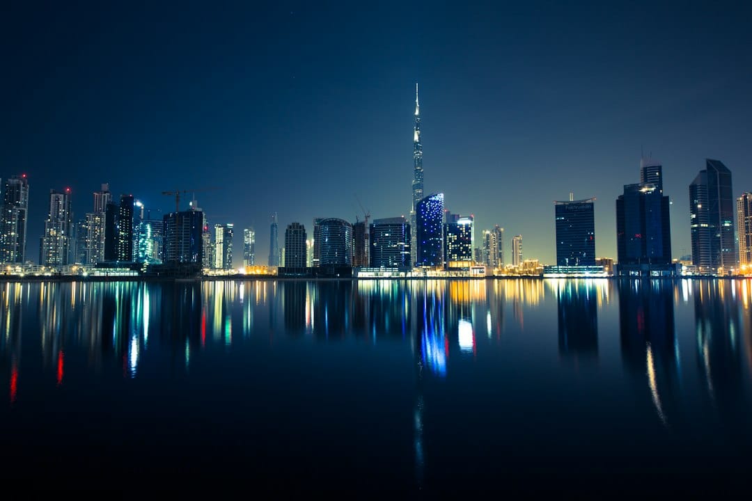Dubai skyline and waterfront at night
